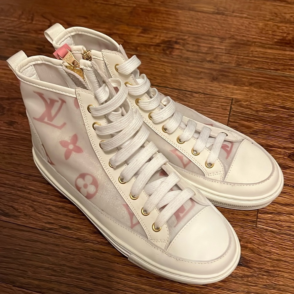 Never been worn pink and white LV high tops.